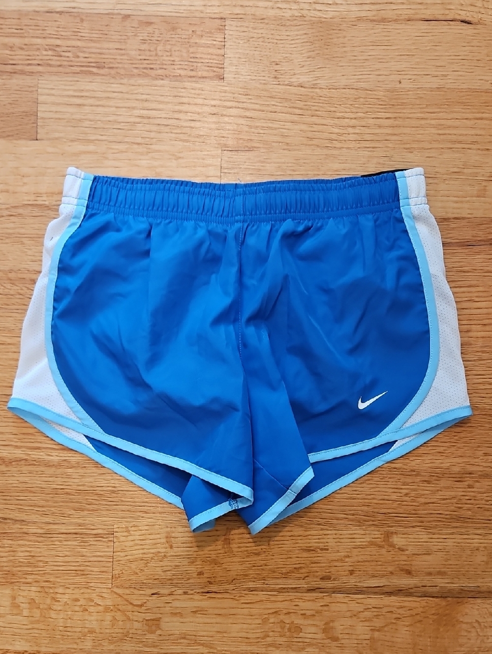 Nike Blue Girls Athletic Shorts with White Mesh and Light Blue Trim